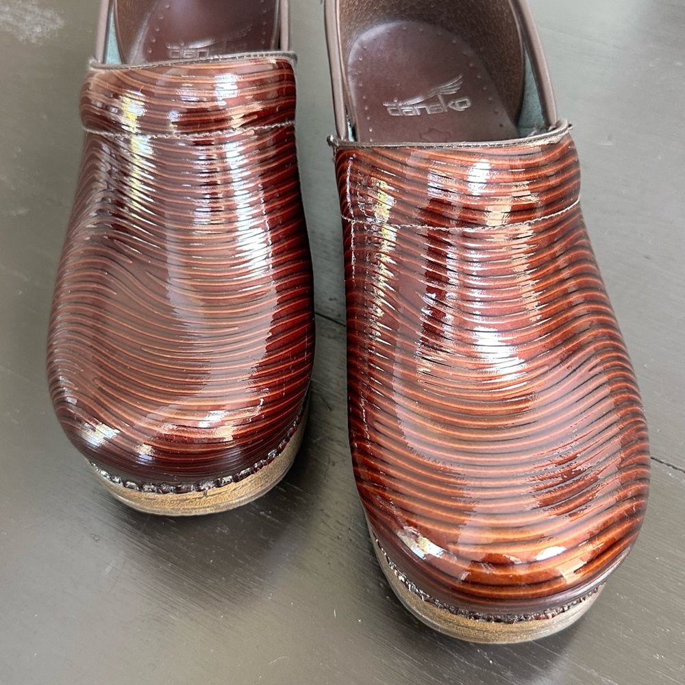 Dansko Brown Clogs with Rippled Texture